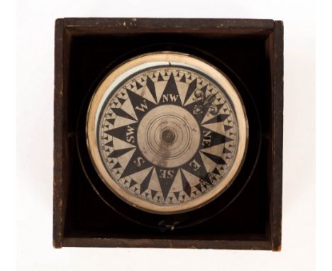 A ship's compass, boxed, the dial 16cm diameter CONDITION REPORT: Condition information is not usually provided in the descri