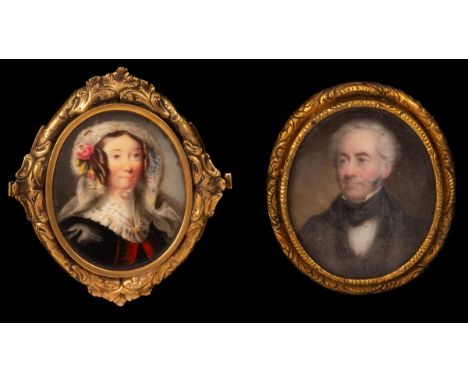 English School, mid 19th Century/Portrait Miniatures of a Lady and a Gentleman/bust length, the lady wearing a white lace vei