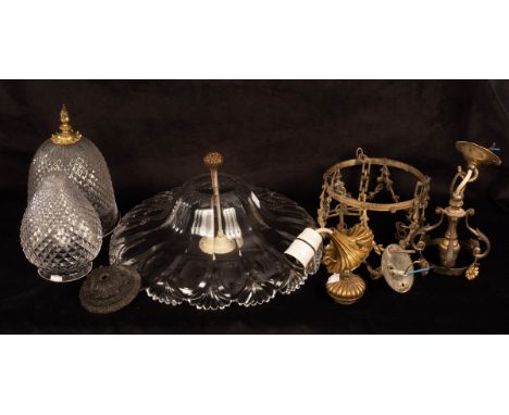 A gilt metal pendant light with surround of garlands and cut glass conical shade with finial, another and a circular cut glas