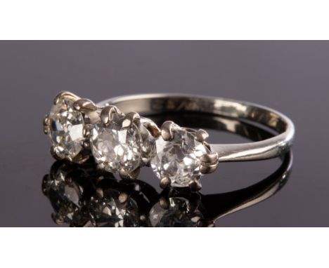 A diamond three-stone ring, the central stone of approximately 0.42ct, claw set in 18ct white gold, size J½, approximately 1.