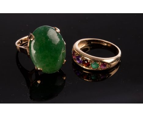 A multi-gem set six-stone ring, circa 1988, set in 9ct yellow gold, approximately 2.9g size N and a 9ct gold ring set an oval