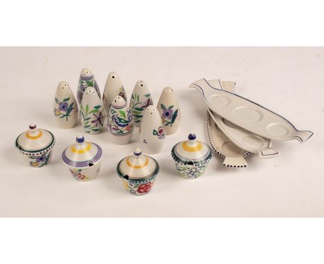 Poole Pottery, three cruets each comprising a salt pot, a pepper pot, a lidded mustard pot and a tray, an additional salt, pe