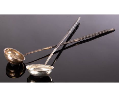 A George III silver toddy ladle, London 1792, with spiral whalebone handle and another CONDITION REPORT: Lot contains an elem