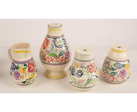 Poole Pottery, three floral lamp bases, the largest 23cm high and a floral jug, 19cm high CONDITION REPORT: Condition informa