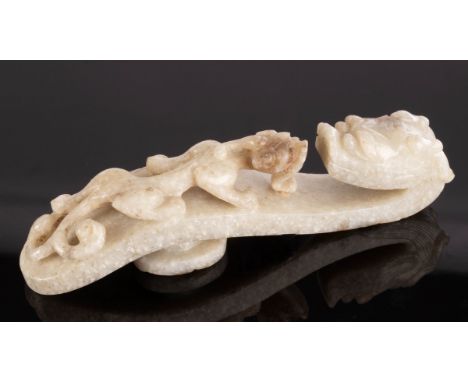 A Chinese grey jade belt hook, 19th Century, carved as two dragons, 11cm long CONDITION REPORT: Good condition