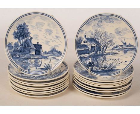 Poole Pottery, twenty blue and white Dutch windmill and river scene plates, each 15.25cm diameter CONDITION REPORT: Condition