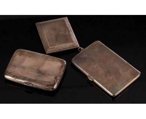 A silver and silver gilt cigarette case, Goldsmiths &amp; Silversmiths Co Ltd., London 1916, initialled EMM, 9cm x 6cm, anoth