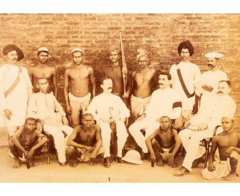 Types of Employees in an Opium Factory/a group of shirtless Indians and seven white suited superiors, four seated in bentwood