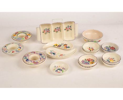 Poole Pottery, a floral three-section hors d'oeuvres dish, 25.5cm wide, a floral bowl, 13cm diameter, eight floral pin dishes