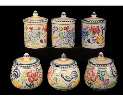 Poole Pottery, three floral jam pots and covers, 10cm high and three floral marmalade pots and covers, 11cm high/see illustra