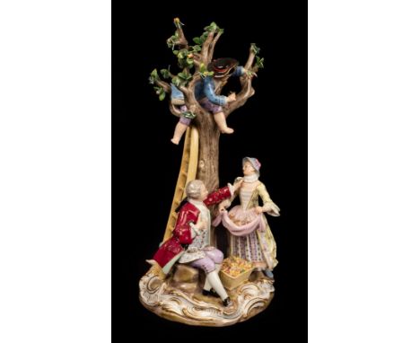 A Meissen group depicting apple pickers, late 19th Century, blue crossed swords mark and incised model No. 2229, 27cm high CO