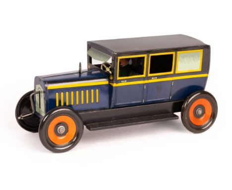 A German tinplate Hess mobile with driver and engine handle, 22cm long/see illustration CONDITION REPORT: Condition informati