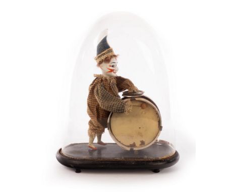 A mid 19th Century French walking Polichinelle clown automaton, beating a drum and symbol, in original clothes, 30cm high, no