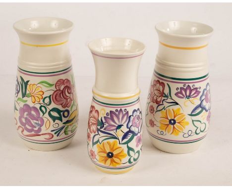 Poole Pottery, three floral vases, the tallest 23cm high CONDITION REPORT: Condition information is not usually provided in t