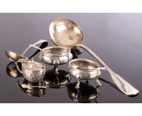 A pair of George III oval silver salt cellars, David & Robert Hennell, London 1767, 8cm wide, a mustard pot, a sauce ladle, t