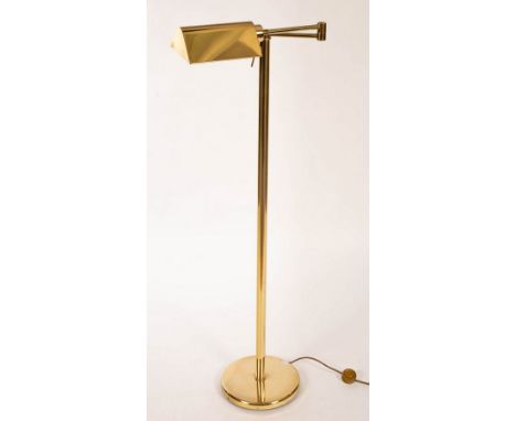 An adjustable brass reading lamp, 125cm high CONDITION REPORT: Condition information is not usually provided in the descripti