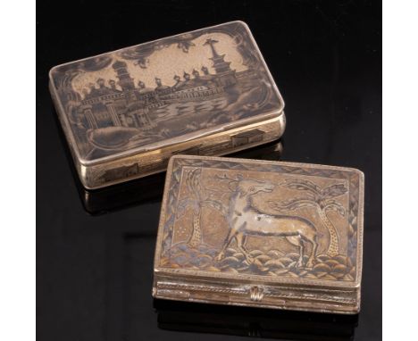 A Russian silver snuff box, 84 HK, the cover with niello decoration of buildings, presentation inscription to the interior, 7