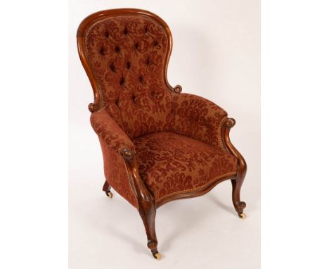 A Victorian walnut button back armchair on cabriole legs CONDITION REPORT: Condition information is not usually provided in t