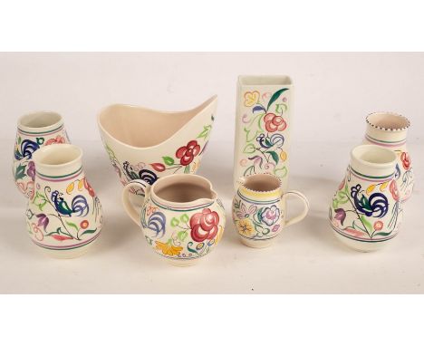 Poole Pottery, four floral baluster vases, the tallest 16cm high, two floral jugs, the largest 12cm high, a floral rectangula