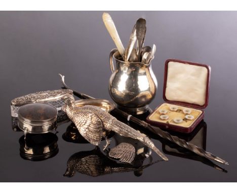 A silver table pheasant, import marks for London, 18.5cm long (wing detached), a silver jug, S Blanckensee & Son Ltd., Birmin