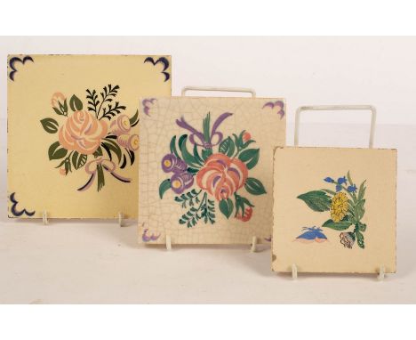 Poole Pottery, three tiles, the largest 15cm wide CONDITION REPORT: Condition information is not usually provided in the desc