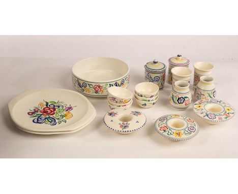 Poole Pottery, two floral marmalade jars, 11cm high, a floral circular serving dish, 19.5cm diameter, two matching plates, th