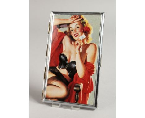 A METAL ENGINE TURNED CIGARETTE CASE, the top with a glamour model, semi-nude holding a card.