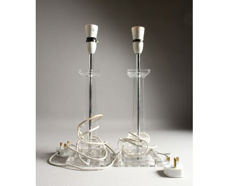 A PAIR OF PERSPEX SQUARE ELECTRIC LAMP BASES. 16ins high.