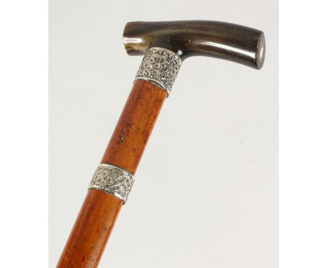 A STRONG EDWARD VII RHINO HANDLED WALKING STICK with two silver bands. London 1903.  3ft long.