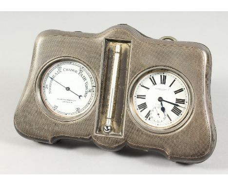 A MAPPIN &amp; WEBB ENGINE TURNED SILVER WATCH, BAROMETER AND THERMOMETER SET. 9ins long x 5ins high.  Birmingham 1916.