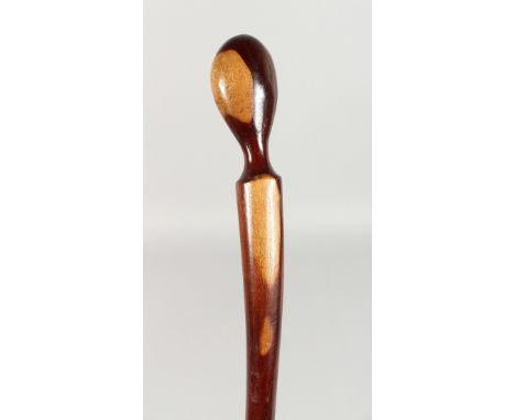 A NATIVE WALKING STICK. 3ft 1ins long.