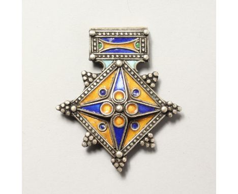 AN ISLAMIC SILVER AND ENAMEL PENDANT.