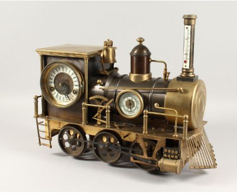 A GOOD AMERICAN LOCOMOTIVE CLOCK with thermometer, barometer and clock dial. 17ins long x 15ins high.