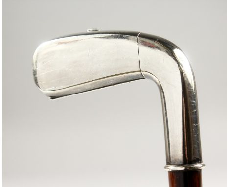 AN UNUSUAL AND RARE WALKING STICK, the handle as a golf club which opens as a cigarette case. 2ft 11ins long.