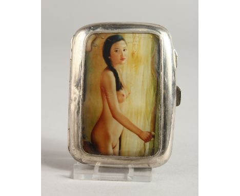 A GEORGE V ENGINE TURNED SILVER CIGARETTE CASE, the top with an enamel of a three-quarter length nude. Birmingham 1935.