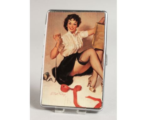 A METAL ENGINE TURNED CIGARETTE CASE. the top with a glamour model with a ribbon.