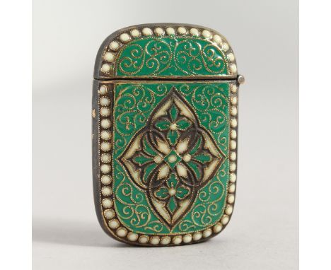 A BRASS AND ENAMEL VESTA.