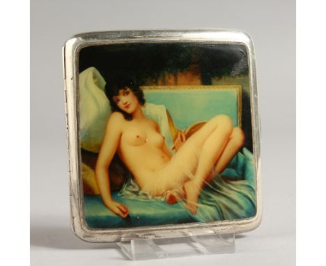 A GEORGE V PLAIN SILVER CIGARETTE CASE, the top with an oval enamel of a seated nude. Birmingham 1921.