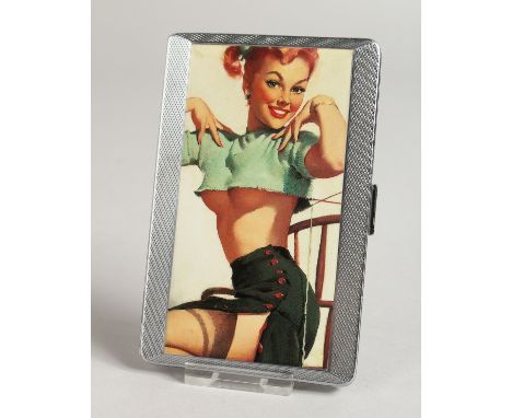 A METAL ENGINE TURNED CIGARETTE CASE. the top with a glamour model, semi-nude.