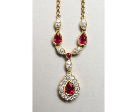 AN 18CT YELLOW GOLD, RUBY AND DIAMOND NECKLACE on chain. Rubies: 1.0cts.  Diamonds: 0.3cts.