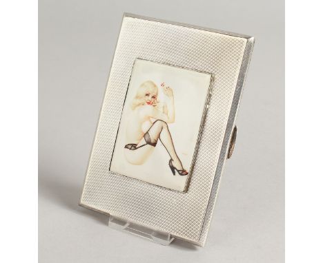 A GEORGE VI ENGINE TURNED SILVER CIGARETTE CASE, the top with an enamel of a nude in stockings. Birmingham 1944.