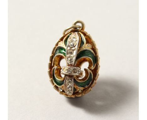 A RUSSIAN SILVER AND ENAMEL EGG.