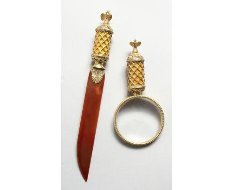A SUPERB RUSSIAN SILVER GILT AND ENAMEL MAGNIFYING GLASS AND PAGE TURNER with eagle finial (2). 5.25ins long.