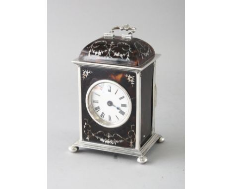 A GOOD SILVER AND TORTOISESHELL CARRIAGE TIMEPIECE, with circular white enamel dial, Roman numerals, inlaid case with ornate 