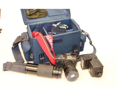 Pentax camera, assorted lenses, Jessops flash light, bag, etc