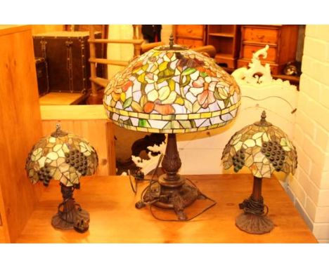 Large Tiffany style table lamp and pair of smaller Tiffany style lamps