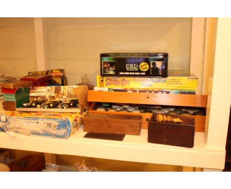 Various games, chess pieces, box of paints, dominoes, etc