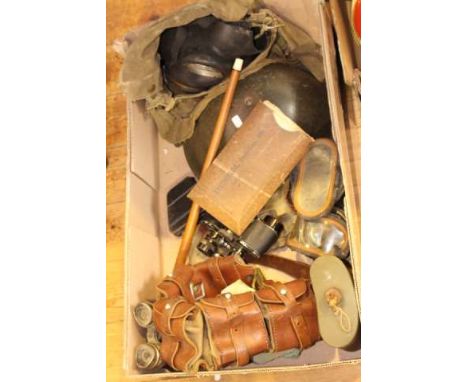 Box of militaire including gas mask, helmet, binoculars