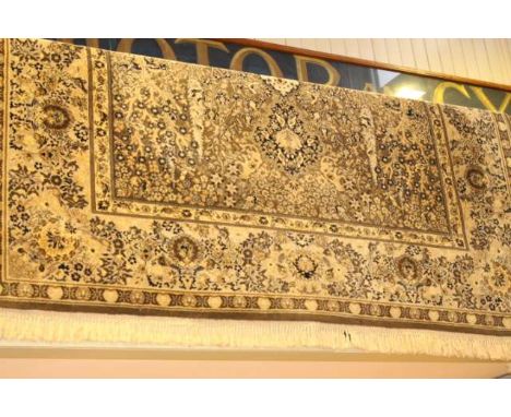 green ground Persian design carpet 3.40 x 2.50