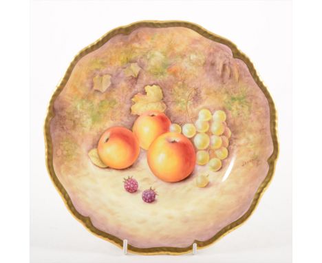 A Royal Worcester cabinet plate, painted with fruit, signed J. Reed, shaped and gadrooned outline, diameter 24cm.